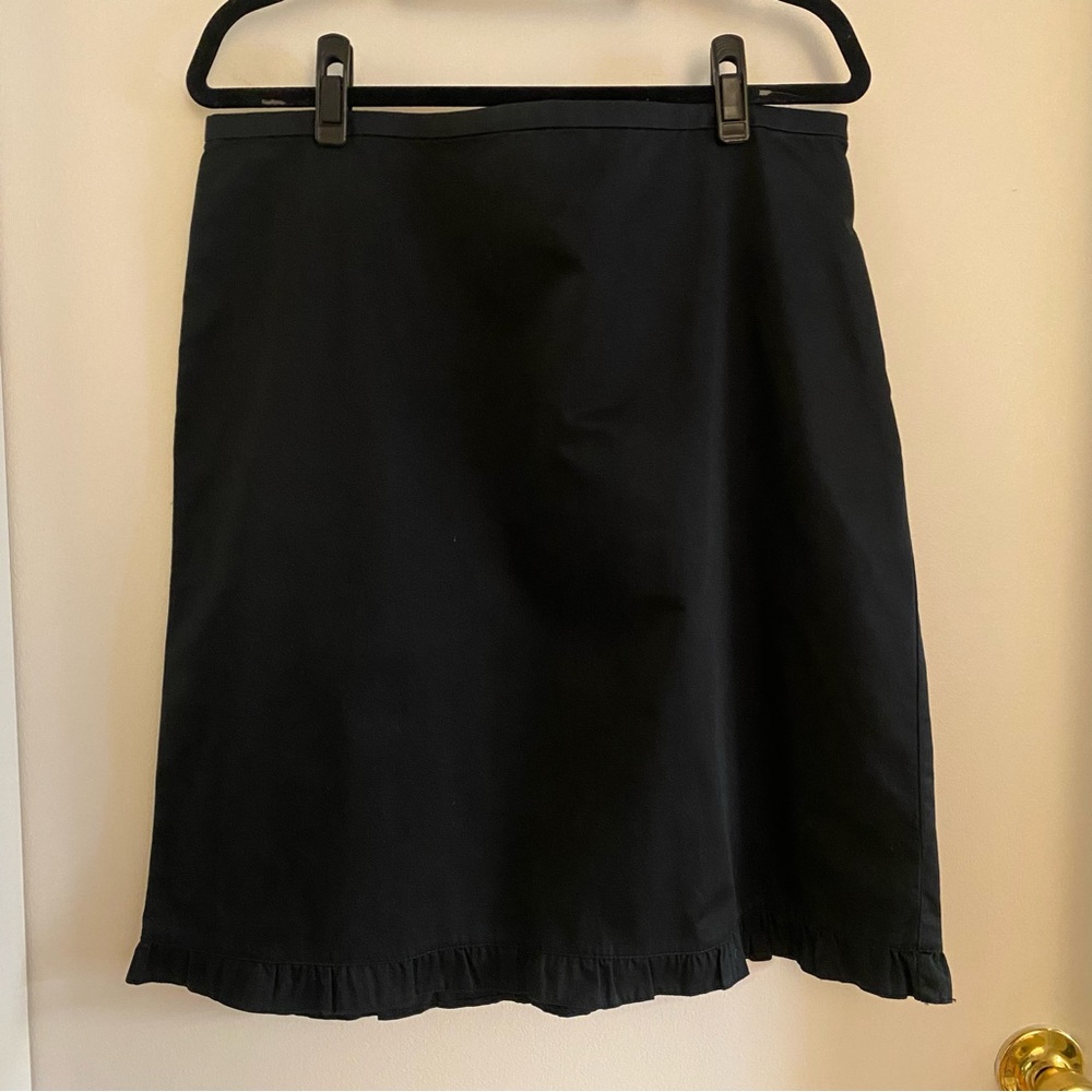 Tommy Hilfiger dark blue skirt with ruffled trim. Size 14.